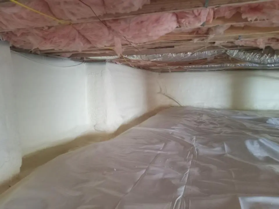 Crawl space encapsulation with closed-cell spray foam for Spray Foam Roofing in Belding